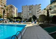 Buy Apartment in Mahmutlar partially furnished with a glazed balcony and sea view 7 