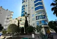 Buy Apartment in Mahmutlar partially furnished with a glazed balcony and sea view 8 