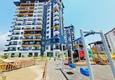 Buy 1+1 apartment with new furniture mountain views in a modern complex - Mahmutlar district, Alanya 10