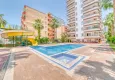 Buy Linear four-room apartment with furniture and sea view - Mahmutlar 1