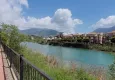 Buy Real estate for a residence permit. Two-bedroom apartment with furniture and views of the Dim River — Alanya, Tosmur 12 