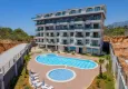 Buy 2+1 duplex penthouse with new furniture and mountain views in Oba, Alanya 1