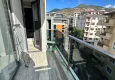 Affordable Purchase 2+1 apartment with furniture, separate kitchen and mountain views - Alanya Center 13