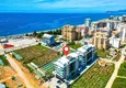 Buy 2+1 apartment in a new residential complex with a private beach. Kargicak District, Alanya 1