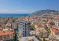 Buy 2+1 apartment with furniture, separate kitchen and mountain views - Alanya Center 2
