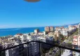 Affordable Purchase Modern 1+1 apartment with panoramic views in the heart of Mahmutlar - just 120 meters from the beach. 12 