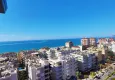 Buy Modern 1+1 apartment with panoramic views in the heart of Mahmutlar - just 120 meters from the beach. 1 