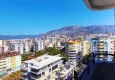 Affordable Purchase Modern 1+1 apartment with panoramic views in the heart of Mahmutlar - just 120 meters from the beach. 15 