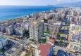 Buy Modern 1+1 apartment with panoramic views in the heart of Mahmutlar - just 120 meters from the beach. 2 