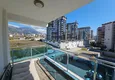 Affordable Purchase 1+1 apartment with furniture and mountain views in a luxury complex — Alanya, Mahmutlar 15 
