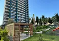 Buy 1+1 apartment with sea view and quality finishes - Mersin, Tezje district 1