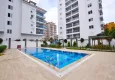 Buy Furnished 2+1 apartment with mountain views in Mahmutlar, Alanya 2 