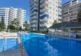 Buy Apartment 2+1 with furniture and two glazed balconies 450 meters from the sea - Mahmutlar 3 