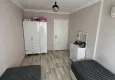 Affordable Purchase Furnished two-bedroom apartment in a cozy complex - Mahmutlar, Alanya 13