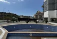 Buy 2+1 penthouse with sea and mountain views in Demirtas — primary property in a small apartment complex 5 