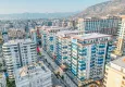 Buy Turnkey one-bedroom apartment with two glazed balconies in a prestigious complex - Mahmutlar, Alanya 2