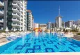 Buy Turnkey one-bedroom apartment with two glazed balconies in a prestigious complex - Mahmutlar, Alanya 4