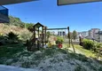 Buy 2+1 penthouse duplex with sea and mountain views in the center of Alanya 11 