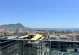 Affordable Purchase  2+1 penthouse duplex with sea and mountain views in the center of Alanya 17 