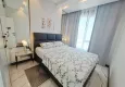 Affordable Purchase 2+1 apartment with furniture, glazed balcony and sea view in the center of Mahmutlar, Alanya 11 