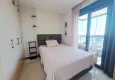 Affordable Purchase 2+1 apartment with furniture, glazed balcony and sea view in the center of Mahmutlar, Alanya 9 