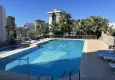 Buy 2+1 apartment with furniture and mountain views in Mahmutlar at an attractive price 4