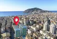 Buy Linear 3+1 apartment in the center of Alanya — turnkey, suitable for a residence permit, separate kitchen, sea and mountain views 1