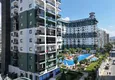 Buy Furnished 1+1 apartment in Mahmutlar, Alanya — sea view, complex with hotel infrastructure 4 