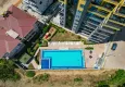 Buy Linear 3+1 apartment with furniture and separate kitchen — in Alanya, Mahmutlar district 5 
