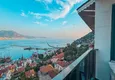 Affordable Purchase  3+1 apartment for a residence permit in Alanya, Kale district - furnished and with panoramic views of the sea and port  40 