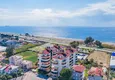 Buy 2+1 apartment in Demirtas - furnished with sea and mountain views 1