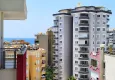 Affordable Purchase 2+1 apartment with sea view in the center of Mahmutlar — furniture, separate kitchen and glazed balcony 25 