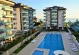 Buy 1+1 apartment with furniture and sea view - Kestel district, first coastal 1