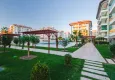 Buy 1+1 apartment with furniture and sea view - Kestel district, first coastal 6