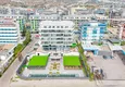 Buy 2+1 apartment with sea view in Kargicak on the beachfront 1