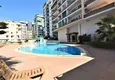 Buy Apartment 1+1 with furniture, sea and mountain views in the center of Mahmutlar - 400 m to the beach 5 