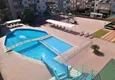 Buy Apartment 1+1 with furniture, sea and mountain views in the center of Mahmutlar - 400 m to the beach 7 