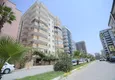 Buy 2+1 apartment in Mahmutlar with furniture, a separate kitchen and a glazed balcony  1 
