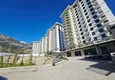 Buy 1+1 apartment with mountain views in Mahmutlar - a new residential complex with a transfer to the sea 18 