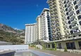 Buy 1+1 apartment with mountain views in Mahmutlar - a new residential complex with a transfer to the sea 4 