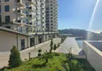 Buy 1+1 apartment with mountain views in Mahmutlar - a new residential complex with a transfer to the sea 6 