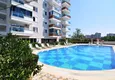 Buy 1+1 apartment in Mahmutlar — new furniture, 70 m², glazed balcony, sea and mountain views 9 