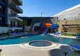 Buy 2+1 penthouse duplex in Mahmutlar — furniture, sea and mountain views, complex with hotel-level service 8 