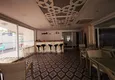 Buy 2+1 apartment 140 m2 in Mahmutlar — furniture, glazed balcony, premium complex 18 