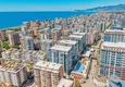 Buy 1+1 panoramic apartment in the center of Mahmutlar - luxury furniture, the sea within walking distance 1