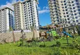 Buy Real estate in Alanya with sea view - 1+1 apartment in Mahmutlar 13 