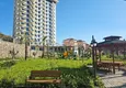 Buy Real estate in Alanya with sea view - 1+1 apartment in Mahmutlar 14 