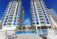 Buy Rent in Alanya - 2+1 apartment with furniture and sea view in Mahmutlar B45 2 
