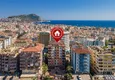 Buy 2+1 apartment in the center of Alanya — furniture, mountain view, glazed balcony, Cleopatra beach area 1