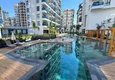 Buy Property for a residence permit in Mahmutlar - 3+1 garden duplex with a private terrace and access to the pool 10 